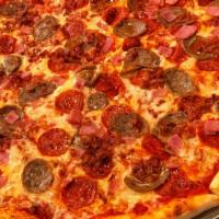 Meat Lovers · Pepperoni, Italian sausage, diced ham, crumbled bacon, mozzarella, red sauce.