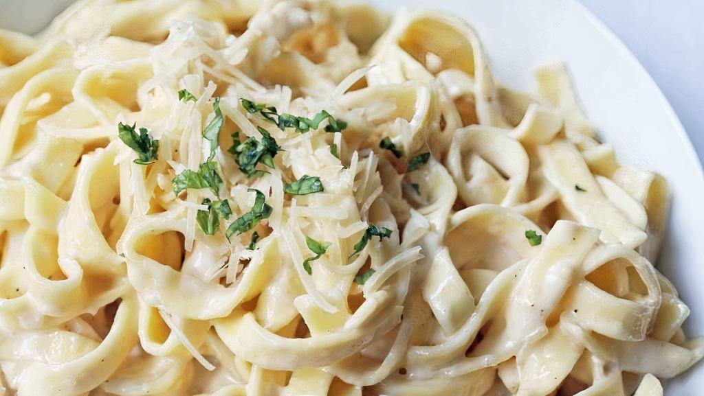 Side Of Pasta Alfredo · Pasta cooked al dente and tossed in our creamy homemade alfredo sauce.