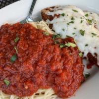 Parmigiana · Chicken, breaded, covered w/ marinara sauce, topped with mozzarella cheese & baked.
