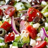 Greek Salad · Lettuce, tomato, green pepper, onion, black olive, feta cheese, and mozzarella cheese.