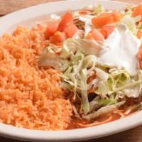 Special 6 · Two chicken enchiladas topped with sour cream salad. Served with our choice of rice or beans.