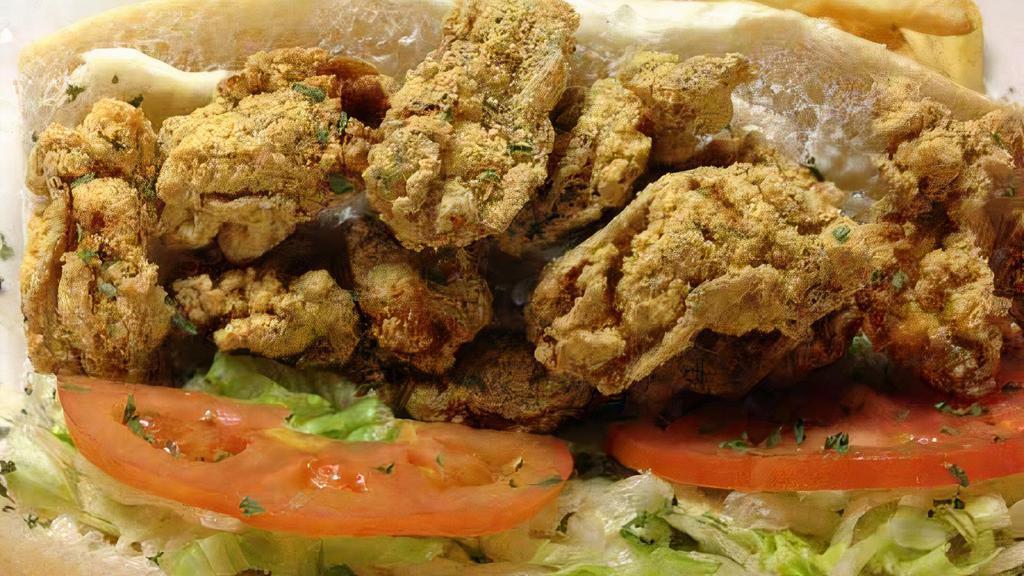 Oyster Po Boy · Po Boy dressed with lettuce, tomato and pickle. All condiments added on the side.