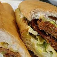 Hot Sausage Po Boy · Po Boy dressed with lettuce, tomato and pickle. All condiments added on the side.