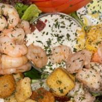 Sautéed Shrimp Salad · Salad dressed with lettuce, tomato, cheese, bacon, croutons, olives and eggs.