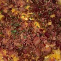 Bacon Cheddar Fries · Fries topped with seasoning, cheese, and bacon.