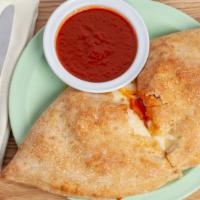 Stromboli (Small) · Inside: Pepperoni, Sausage, Beef, Mushrooms, Onions, Green Peppers, Tomato Sauce and Mozzare...