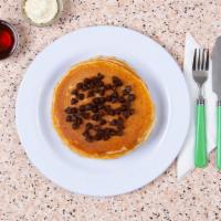 Chocolate Chip Pancakes · Three rich, fluffy, chocolate chip pancakes with maple syrup and butter.