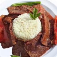 Rice & Doner Kebab · Daily baked seitan doner kebab served with rice, topped with tomato sauce and yogurt sauce.
