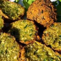 Side Of Collard Green Falafel · 3 pieces with tzatziki sauce, served with pita bread or gluten-free tortillas.