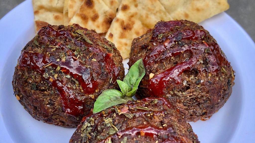 Side Of Meatballs · Three pieces, with pita bread.