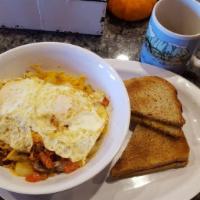 Skillet Dishes · Your choice of ingredients grilled with fries. Topped with your choice of cheese and two egg...