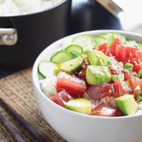 Poké Bowl - Pick 2 · Signature Hawaiian style cuisine served with diced chunks of raw or marinated fish, tossed o...