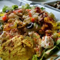 Ginormous Greek Salad · VEG. Romain, Roma, red onion, cucumber, kalamata, pepperoncini and feta.