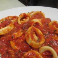Calamari Marinara · Calamari served over your choice of pasta and topped with homemade marinara sauce.