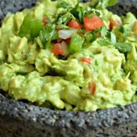 Mexican Guacamole · Prepared table-side to your liking.