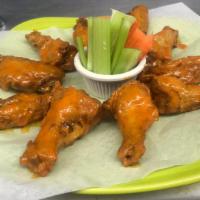 Chicken Wings · Ten wings with your choice of hot or mild.