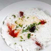 Tzatziki · Greek yogurt with cucumber, garlic, extra virgin olive oil, served pita bread.