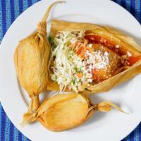 Chuchitos De Res O Pollo (Each) · Traditional guatemalan corn flour cakes filled with chicken or beef. Topped with cabbage sal...