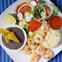 Grilled Shrimp · Sautéed shrimp, flavored with seafood seasoning. Served with rice salad and beans.