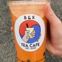 Thai Milk Tea · A black tea blend with remnants of vanilla & chai, sweetened with sugar and condensed milk.