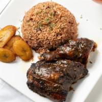 Jerk Chicken · Spicy Jerk Chicken, served with rice/beans and your choice of one side
