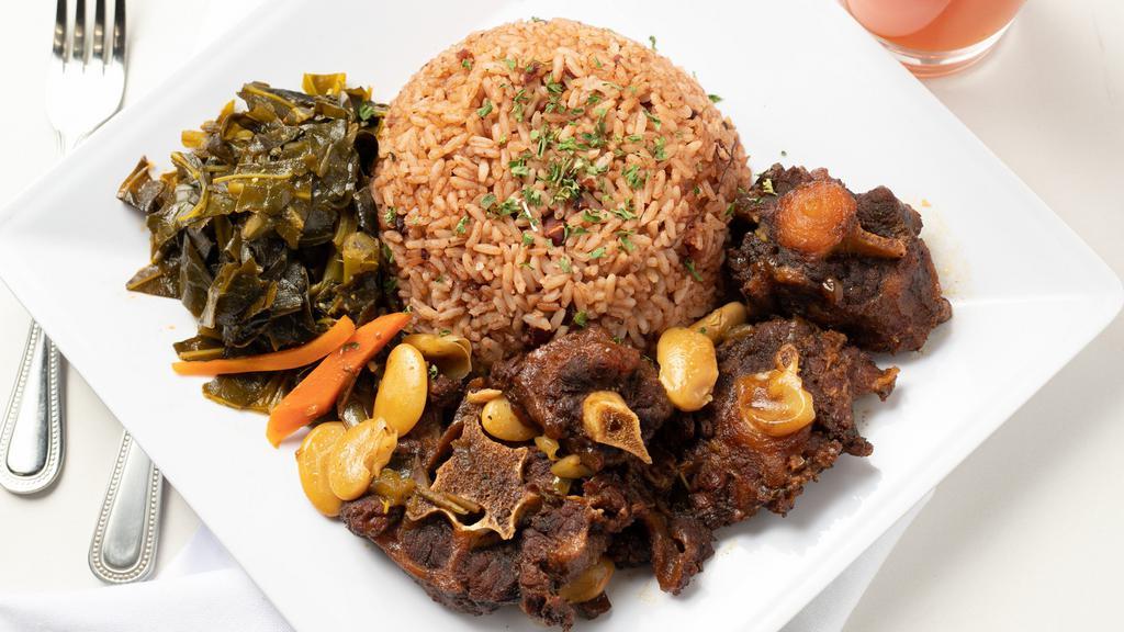 Oxtails · Mild Jamaican Oxtails, served with Rice/Beans and your choice of one side