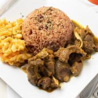 Curry Goat · Spicy Jamaican Curry Goat, served with Rice/Beans and your choice of one side