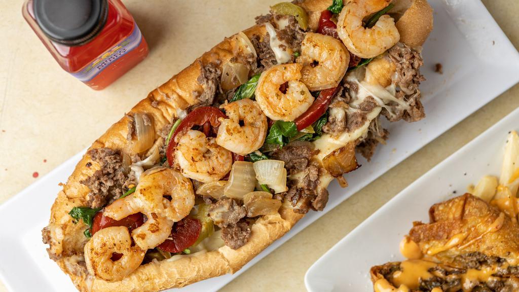 Surf & Turf Phillie · Philli cheesesteak loaded with spinach, sweet peppers, Onions, Jumbo shrimp & American Cheese on an Amoroso roll