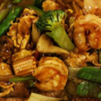 San Shan Noodles · Stir fried chicken, beef and shrimp with vegetable on top of crispy egg noodles.