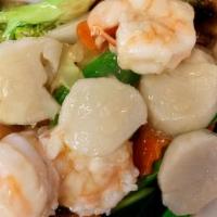 Shrimp And Scallops · Shrimp and scallops with water chestnuts, mushrooms, baby corn, snow peas and napa in light ...