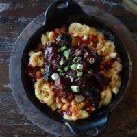 Smokehouse Mac · Three cheese Mac & Cheese topped with choice of meat and Signature sauce