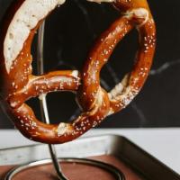 Bavarian Pretzel · Handcrafted soft pretzel with Beer cheese and mustard..