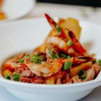 Shrimp And Grits · Large white shrimp sauteed with Andouille sausage, Tasso ham and our house made seafood jus....