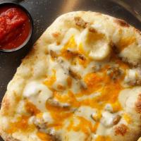 Garlic Cheesy Breadsticks · Hand-Stretched Dough, Roasted Garlic Oil, Shredded Mozzarella and Cheddar Cheese with Side o...