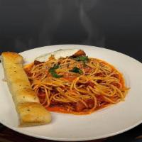 Chicken Parmesan · Breaded Chicken Served Over Spaghetti with Provolone Cheese & Our Special Homemade Marinara ...