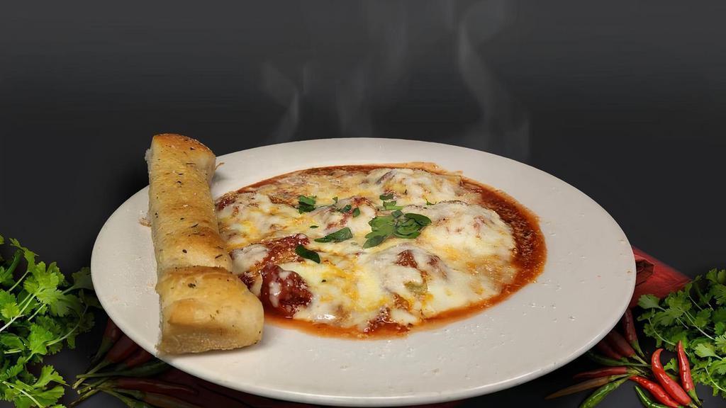 Manicotti · Large stuffed shells filled with Mozzarella, Ricotta Cheese & Our Special Homemade Marinara Sauce.