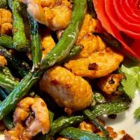 Szechuan Style String Beans · Spicy hot. Fresh greens beans stir-fried with our special spicy house sauce