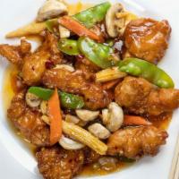 Orange Chicken · Chicken breast deep-fried on a bed of lettuce with a fresh natural orange sauce.