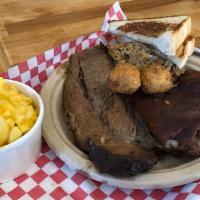 3 Meat Platter · Beef brisket, Pulled Pork and Smoked chicken with 1 side and Texas Toast and hush puppies.