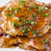 Vegetable Egg Foo Young菜元旦 · Onion, egg, Chinese vegetables, peas, carrots, and broccoli. Served with white rice and grav...