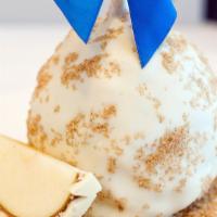 Apple Pie Apple · Caramel apple rolled in brown sugar and cinnamon, covered in Belgian white chocolate, then d...