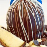 Triple Chocolate Apple · A chocolate lover’s delight! A caramel apple, coated with Belgian dark chocolate, then drizz...