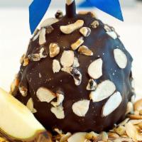 Nutty Choice Apple · Caramel apple rolled in cashews, almonds and walnuts, covered with Belgian dark or milk choc...