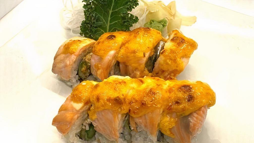 Baked Salmon Roll · Crab Salad, Tempura, Asparagus Inside, Fresh Salmon Outside, Spicy Aioli on top then baked