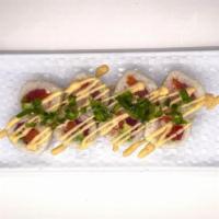Jalapeño Candy Roll · Tuna, Salmon, Shrimp, Whitefish, Avocado, Wrapped in Rice Paper, Topped with Sweet Jalapeño,...
