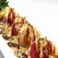 Sushi Ornaments · Tuna, Avocado, Salmon, Yellowtail, Wrapped in Sushi Rice BAll Crunches and Sweet Sauce