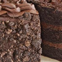 Triple Threat Chocolate Cake · A triple Layer Devil's food cake with a rich chocolate Buttercream icing.