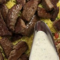 Gyro Plate · Spiced lamb and beef. Served with a tzatziki sauce.