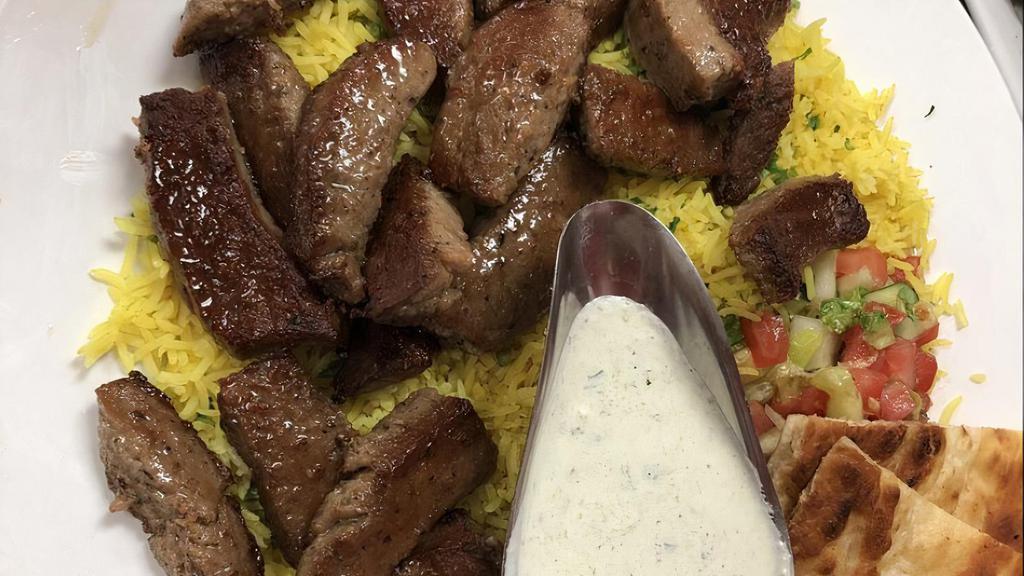 Gyro Plate · Spiced lamb and beef. Served with a tzatziki sauce.