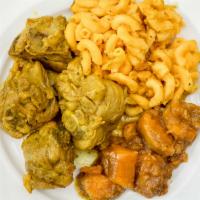 Medium Curry Chicken · Comes with plantains or cornbread and two sides.